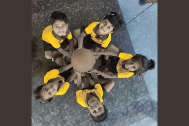 Children taking part in a teamwork activity